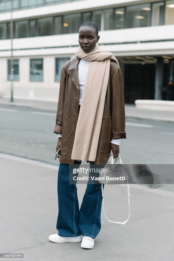 Akon Model Model Akon Changkou poses after the Fendi show at the Palais ...