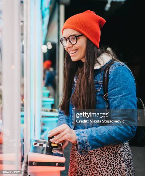 toy machine and woman - the ride of champions stock pictures, royalty-free photos & images