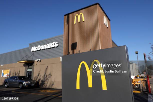Car sits in the drive-thru at a McDonald's restaurant on January 27, 2022 in El Cerrito, California. McDonald's reported fourth quarter earnings that...