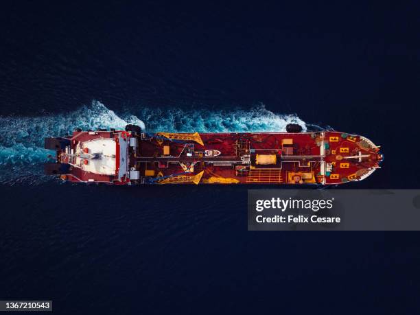 an oil tanker on the move from above. - ship fumes stock pictures, royalty-free photos & images