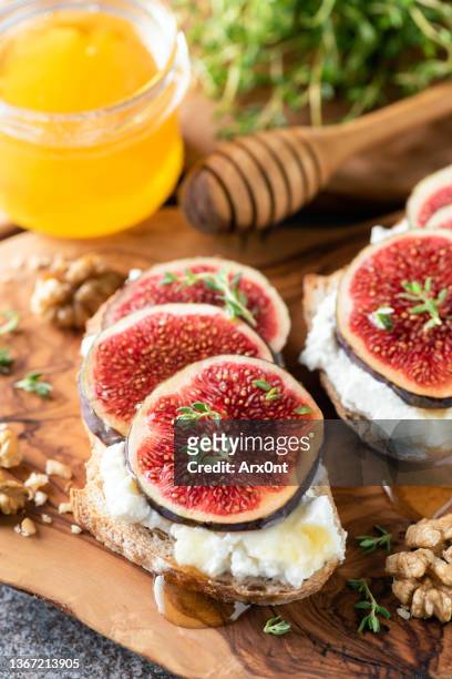 figs and ricotta cheese bruschetta - crostini stock pictures, royalty-free photos & images