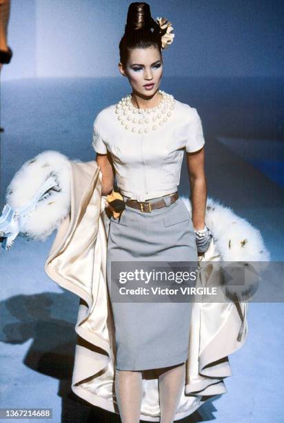 Kate Moss walks the runway during the Thierry Mugler Ready to Wear Fall/Winter 1995-1996 fashion show as part of the Paris Fashion Week on March 6,...