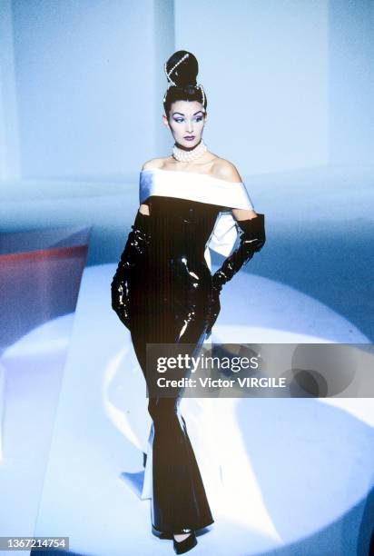 Model walks the runway during the Thierry Mugler Ready to Wear Fall/Winter 1995-1996 fashion show as part of the Paris Fashion Week on March 6, 1995...