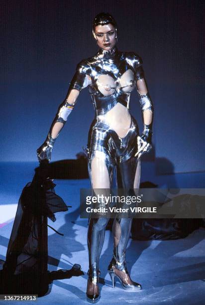 Model walks the runway during the Thierry Mugler Ready to Wear Fall/Winter 1995-1996 fashion show as part of the Paris Fashion Week on March 6, 1995...