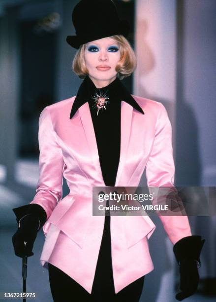 Model walks the runway during the Thierry Mugler Ready to Wear Fall/Winter 1996-1997 fashion show as part of the Paris Fashion Week on March, 1996 in...