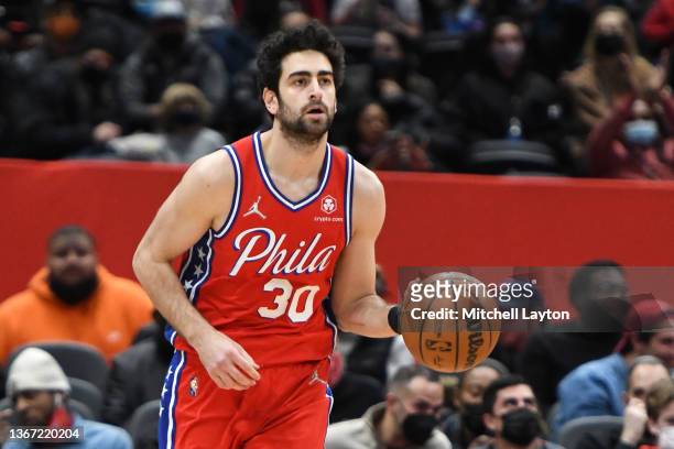 Furkan Korkmaz of the Philadelphia 76ers dribbles up court during a NBA basketball game against the Washington Wizards at the Capital One Arena on...