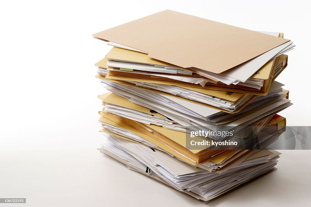 Isolated shot of stacked file folders on white background