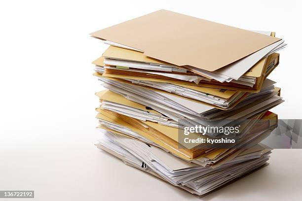 isolated shot of stacked file folders on white background - pile of paper bildbanksfoton och bilder