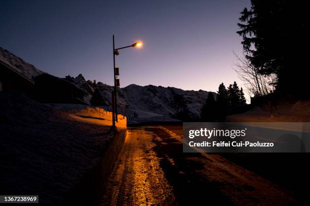 street lamp and contry road at schwägalp - contry road stock pictures, royalty-free photos & images