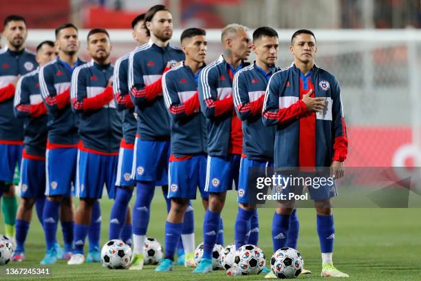 Alexis Sánchez of Chile and teammates line up for the national anthems before a match between Chile and Argentina as part of FIFA World Cup Qatar...