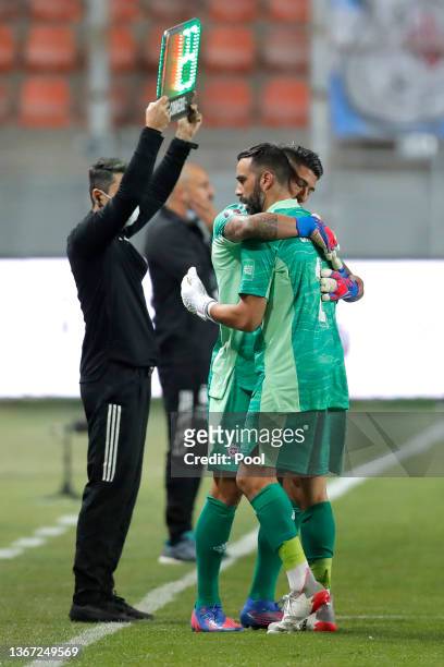 Claudio Bravo of Chile is substituted by teammate Brayan Cortéz after suffering an injury during a match between Chile and Argentina as part of FIFA...
