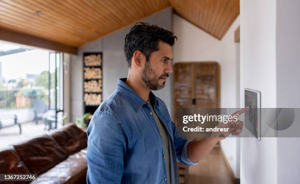 Man Using System 1,361 Lighting Control System Stock Photos, High-Res Pictures, and ...