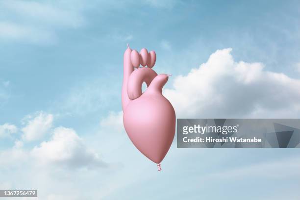 balloon organs in the sky (heart) - fragile photos et images de collection