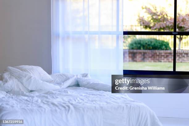 messy bed - unmade bed stock pictures, royalty-free photos & images