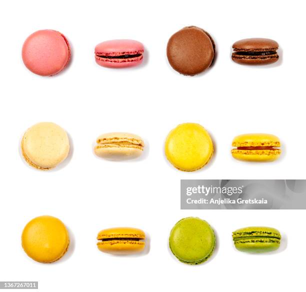 colorful french macarons isolated on white background - macaron stock pictures, royalty-free photos & images