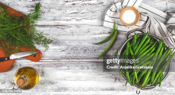 green beans for cooking vegetarian food. - food on cutting board stock pictures, royalty-free photos & images