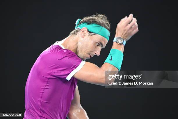 Rafael Nadal of Spain wipes sweat during his Men's Singles semi-final match against Matteo Berrettini of Italy during day 12 of the 2022 Australian...