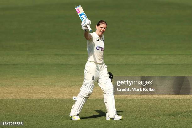 Heather Knight of England celebrates her century during day two of the Women's Test match in the Ashes series between Australia and England at Manuka...