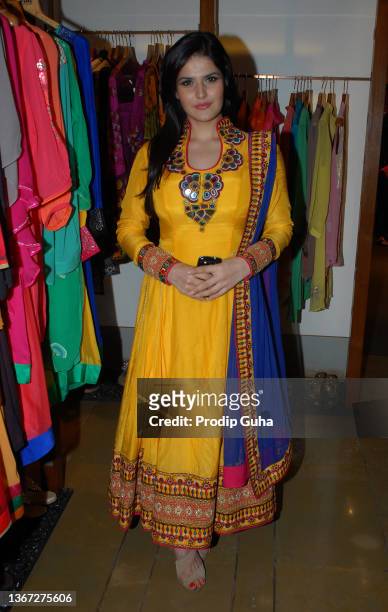 Zarine Khan attends the launch of Nishka Lulla and Rajat Tangri"u2019s new collection at Fuel Fuel store on October 12,2012 in Mumbai, India.