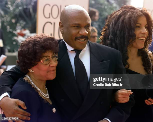 Actor Ving Rhames arrives with his mother Reatha Rhames and wife Valerie Rhames at Golden Globe Awards, January 18, 1998 in Beverly Hills, California.