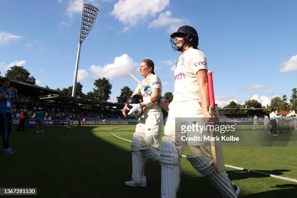 Heather Knight and Sophie Ecclestone of England leave the field at the end of play during day two of the Women's Test match in the Ashes series...