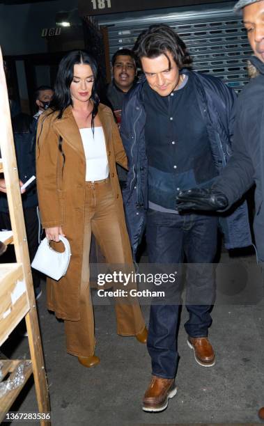 Orlando Bloom and Katy Perry are seen departing Carbone Restaurant on January 28, 2022 in New York City.