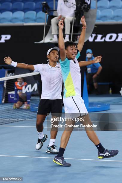 Bruno Kuzuhara of USA and Chak Lam Coleman Wong of Hong Kong celebrate winning their Junior Boys Doubles Final against Alex Michelsen of USA and...