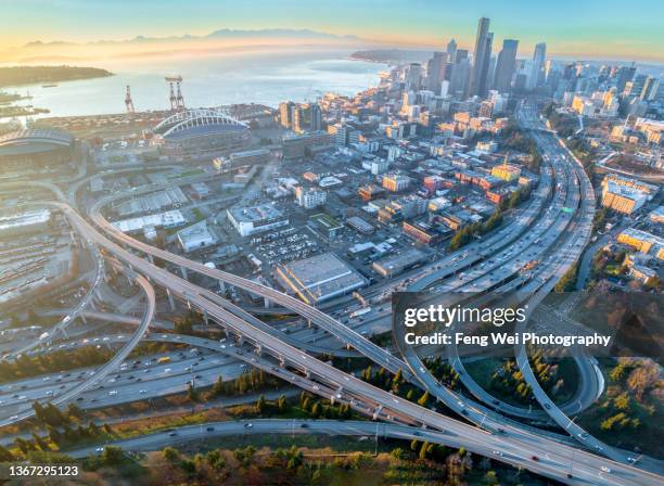 downtown seattle cityscape at dusk - seattle aerial stock pictures, royalty-free photos & images