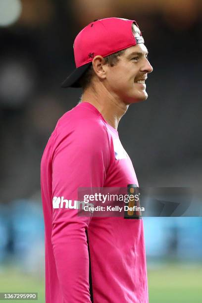 Daniel Hughes of the Sydney Sixers warms up during the Men's Big Bash League match between the Perth Scorchers and the Sydney Sixers at Marvel...