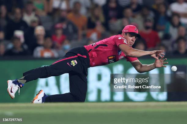 Moises Henriques of the Sydney Sixers fields during the Men's Big Bash League match between the Perth Scorchers and the Sydney Sixers at Marvel...