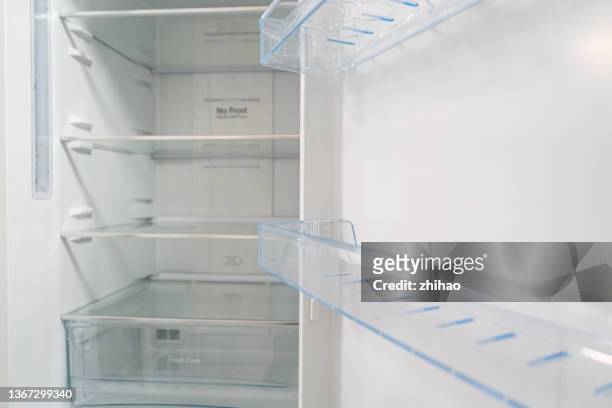 empty refrigerator with open door - cubbyhole stock pictures, royalty-free photos & images