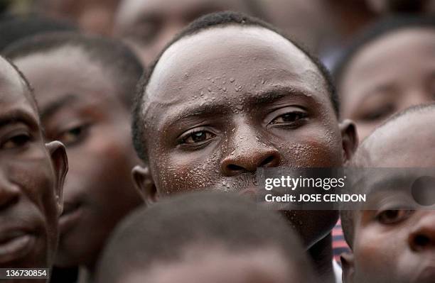 Men In Rwanda Rwandan men attend the ceremony marking the 1994 genocide anniversary ...
