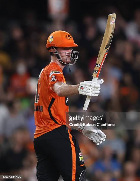 Ashton Turner of the Scorchers celebrates after scoring his half century during the Men's Big Bash League match between the Perth Scorchers and the...