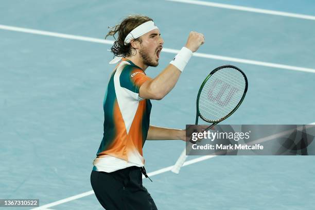 Stefanos Tsitsipas of Greece celebrates winning set point in his Men's Singles semi-final match against Daniil Medvedev of Russia during day 12 of...