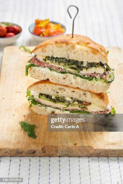 sandwich broccoli salami mozzarella - panini stock pictures, royalty-free photos & images