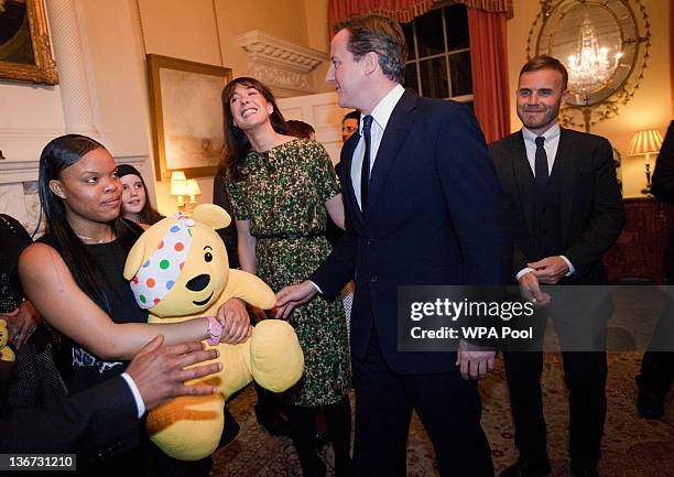 Prime Minister David Cameron , Samantha Cameron and and singer Gary Barlow attend a celebratory reception for BBC Children In Need hosted by Samantha...