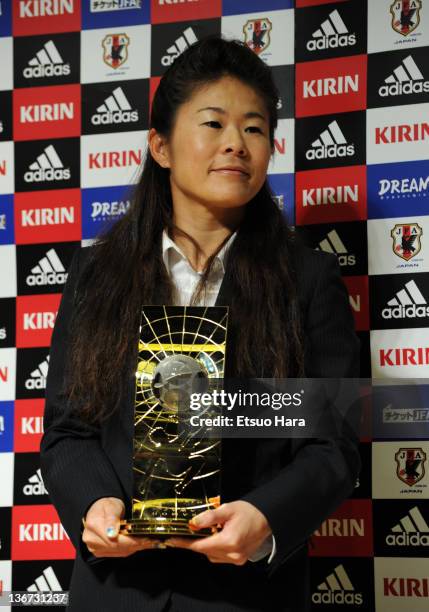 Women's World Player of the Year Homare Sawa poses for photographs with the trophy during the Ballon d'Or Press Conference at JFA House on January...
