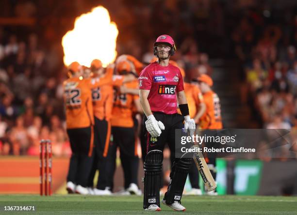 Hayden Kerr of the Sydney Sixers walks off after he was dismissed during the Men's Big Bash League match between the Perth Scorchers and the Sydney...