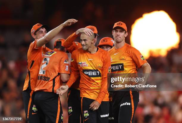 Ashton Agar of the Scorchers celebrates taking the wicket of during the Men's Big Bash League match between the Perth Scorchers and the Sydney Sixers...