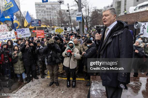 Ukraine's former President Petro Poroshenko speaks to supporters and media outside the Kyiv District Court of Appeal on January 28, 2022. Poroshenko...