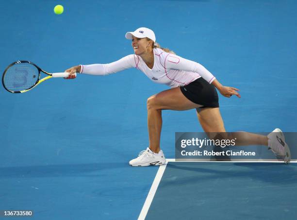 Anastasia Rodionova of Australia returns a shot to Jarmila Gajdosova of Australia during day three of the 2012 Hobart International at Domain Tennis...