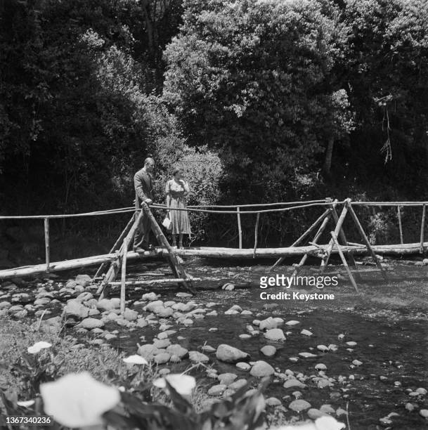 Princess Elizabeth and Prince Philip on a bridge in the grounds of Sagana Lodge in Nyeri County, during a Commonwealth visit to Kenya, 5th February...
