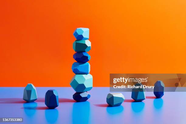 conceptual image of geometric pebbles - undone fotografías e imágenes de stock