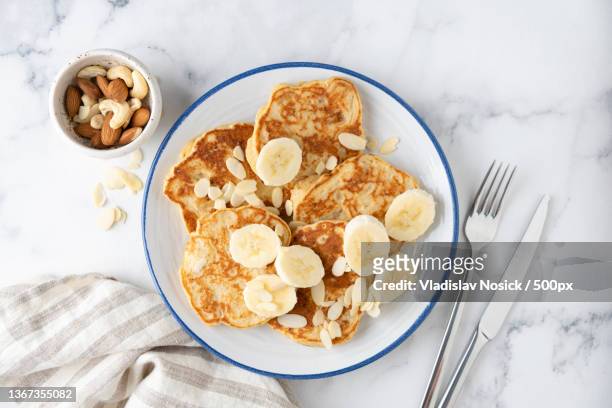 banana protein pancakes,high angle view of breakfast served on table,russia - protein pancakes stock pictures, royalty-free photos & images
