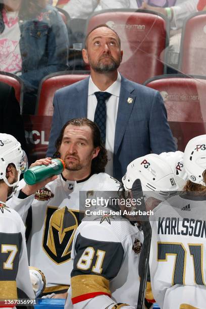 Head coach Peter DeBoer of the Vegas Golden Knights watches a replay during a break in action against the Florida Panthers at the FLA Live Arena on...