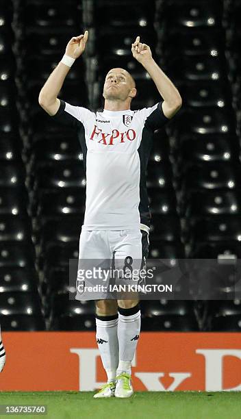Fulham's Andrew Johnson celebrates scoring his goal against FC Twente during a Europa League Group K football match at Craven Cottage in London, on...