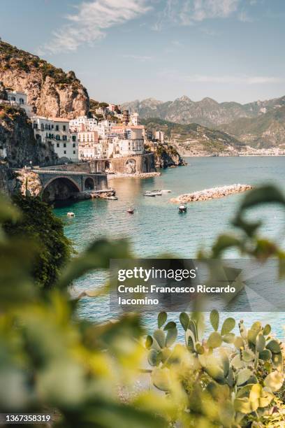 atrani, amalfi coast, campania, sorrento, italy. view of the town and the seaside in a summer day. - sorrento stockfoto's en -beelden