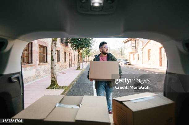 1,970 Loading Car With Boxes Stock Photos, High-Res Pictures, and ...
