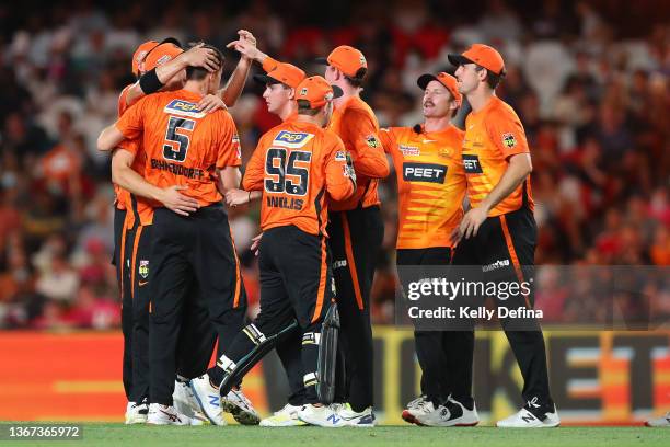 Scorchers celebrate during the Men's Big Bash League match between the Perth Scorchers and the Sydney Sixers at Marvel Stadium, on January 28 in...