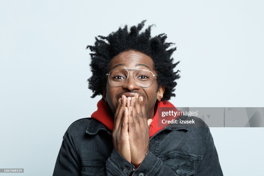 Excited man in red hoodie